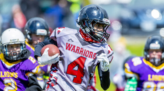 JB Warriors Defeat Lions In Regular-Season Football Opener