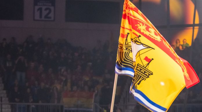 Four speed skaters lead their province or territory into the 2023 Canada Winter Games Opening Ceremony